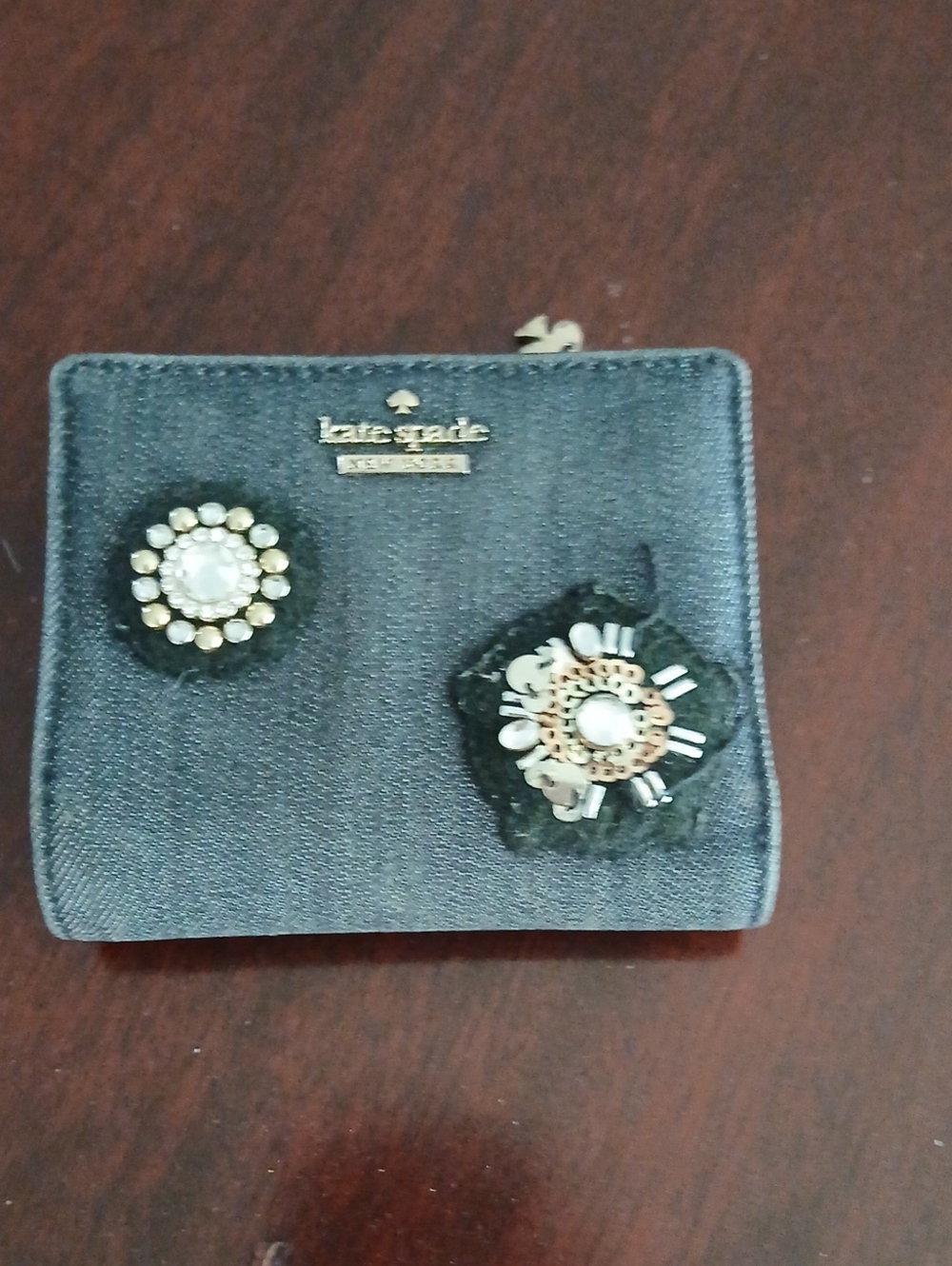 kate spade denim zip card wallet with jeweled floral appliqués in dark blue